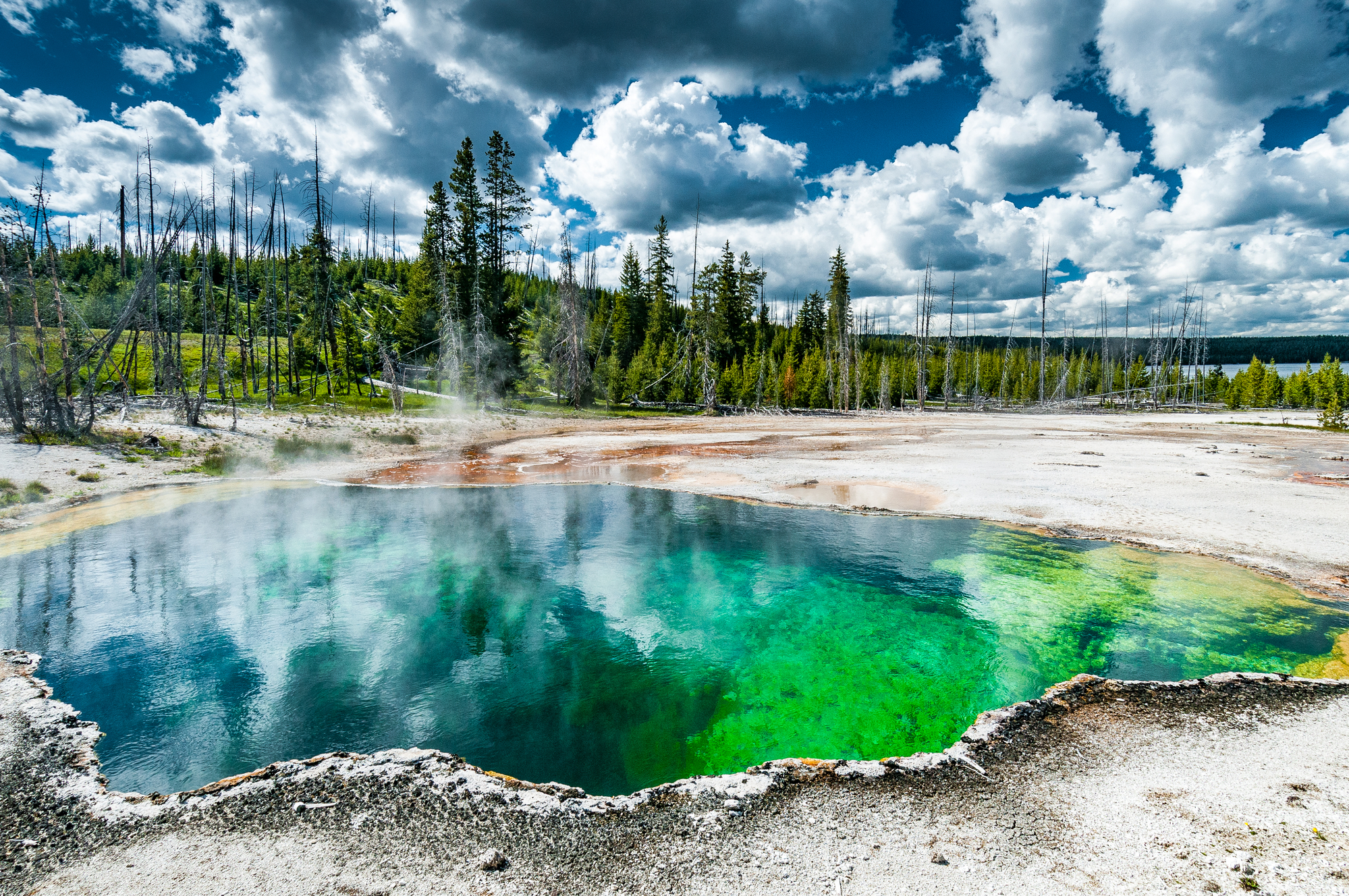 Basin of colorful hot water and sulfur emanation in the area of West Thumb Geyser Basin, Yellowstone National Park